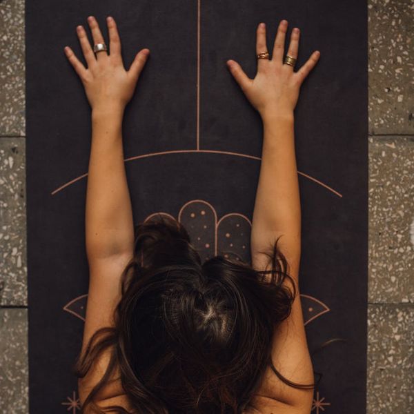 Person meditating in a serene setting, representing inner peace and focus.